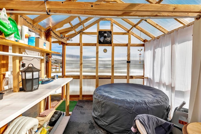 sunroom with lofted ceiling