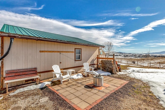 view of patio / terrace featuring fence