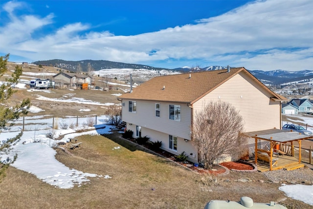 exterior space featuring a mountain view