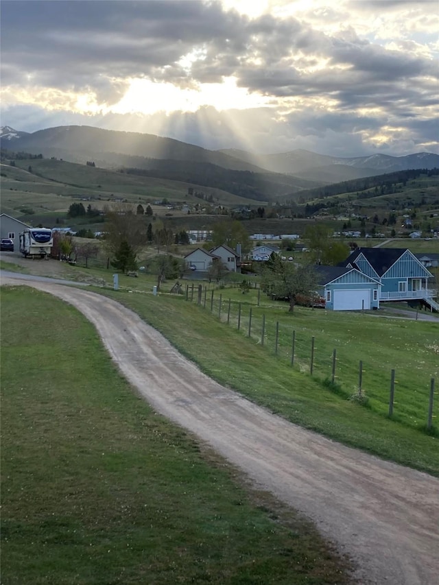 mountain view featuring a rural view