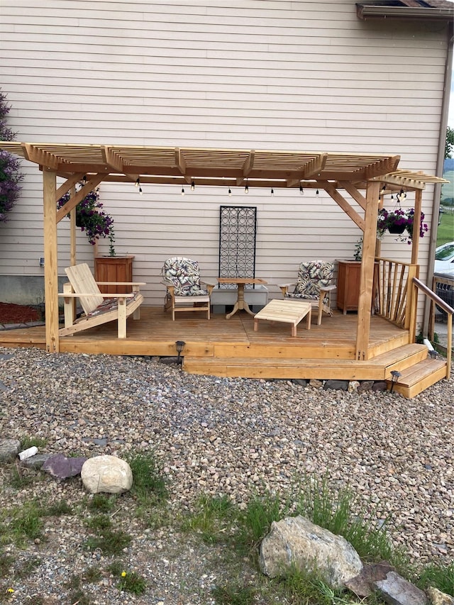 wooden deck featuring a pergola