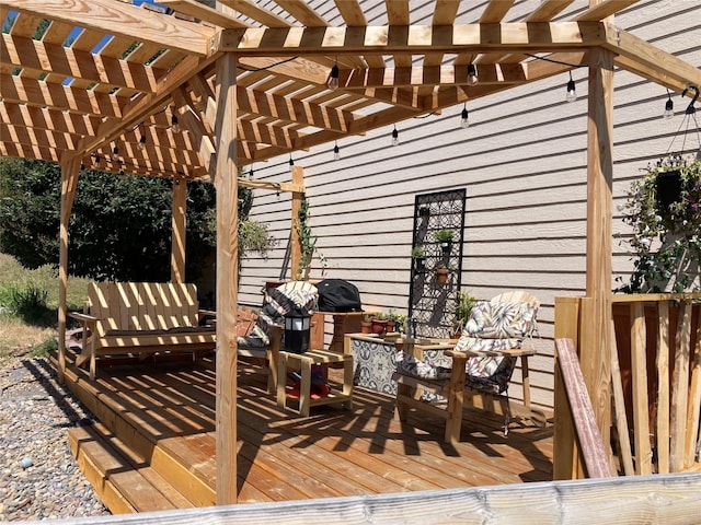 wooden terrace with a pergola