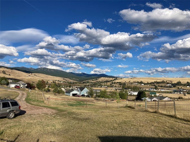 view of mountain feature featuring a rural view