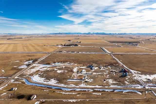 aerial view featuring a mountain view and a rural view