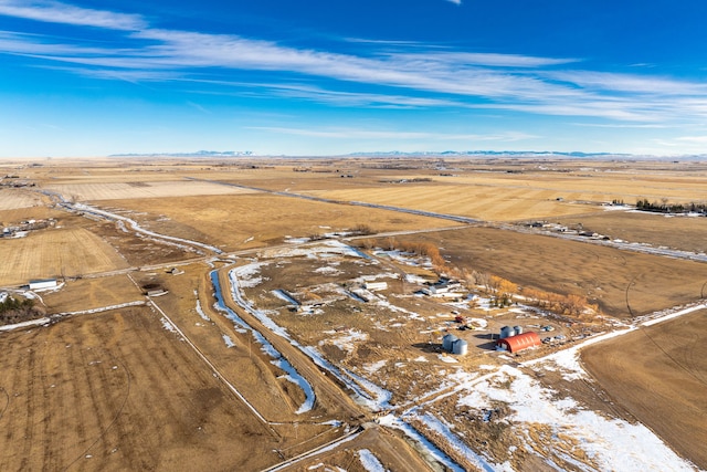 birds eye view of property featuring a rural view and a mountain view