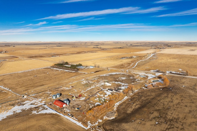 birds eye view of property featuring a rural view