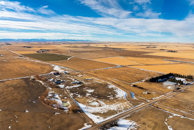 birds eye view of property with a rural view