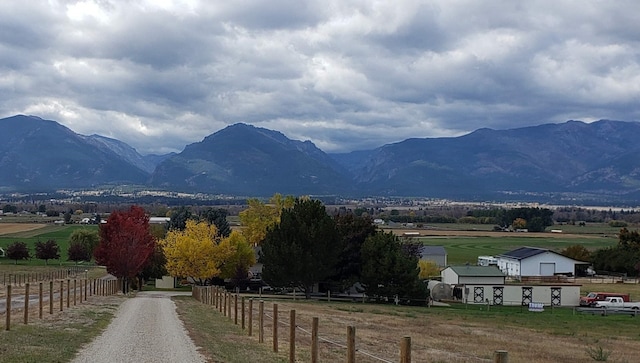 property view of mountains featuring a rural view