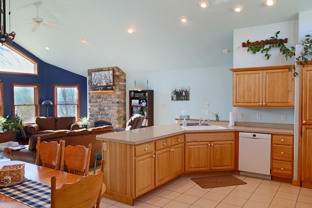 kitchen with a sink, open floor plan, dishwasher, a peninsula, and a ceiling fan