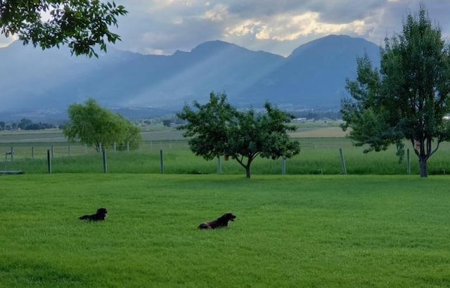 view of mountain feature with a rural view