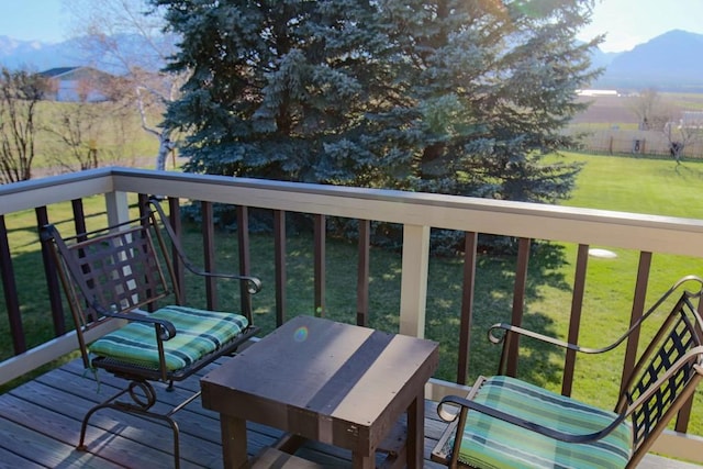 deck featuring a yard