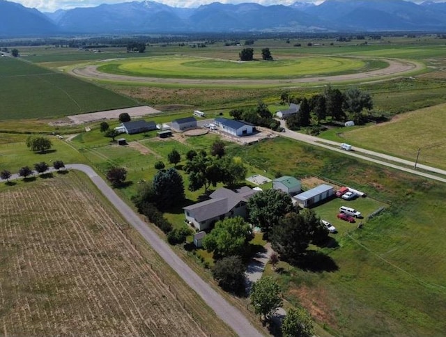 aerial view with a mountain view and a rural view