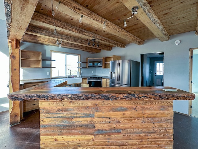 kitchen featuring wooden ceiling, oven, open shelves, dark countertops, and stainless steel fridge