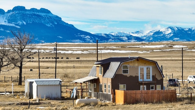 property view of mountains featuring a rural view