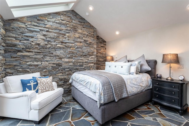 bedroom with lofted ceiling