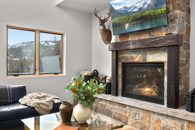 living room featuring a fireplace