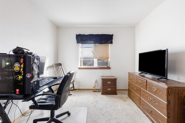 carpeted office with cooling unit and baseboards