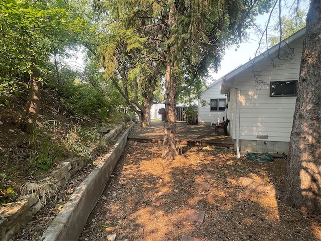 view of yard featuring a deck