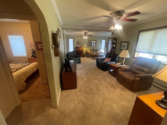 living area featuring carpet floors, arched walkways, and ornamental molding