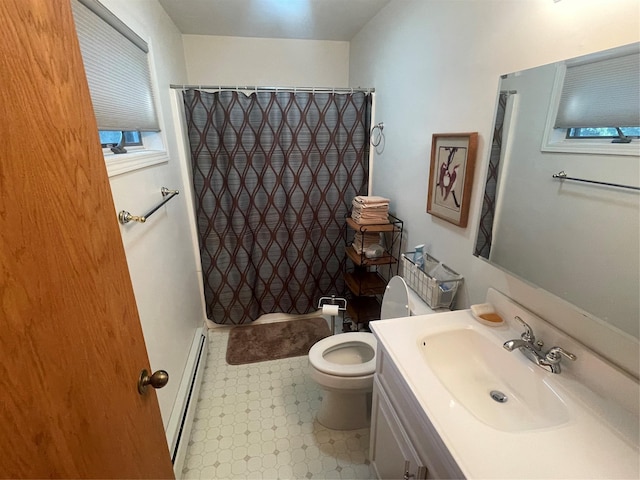 bathroom featuring curtained shower, toilet, a baseboard heating unit, vanity, and tile patterned floors