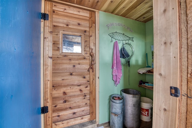 bathroom with wood ceiling