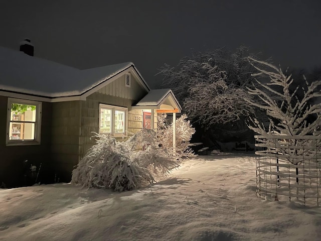 view of property exterior at night