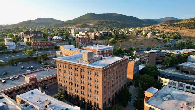 drone / aerial view featuring a mountain view