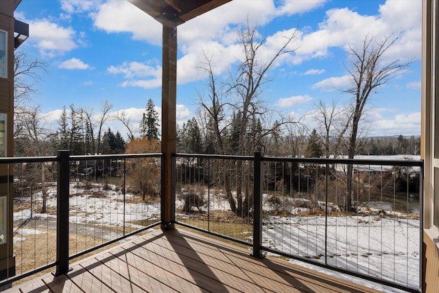 view of snow covered deck