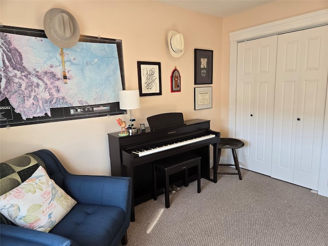 living area featuring carpet flooring