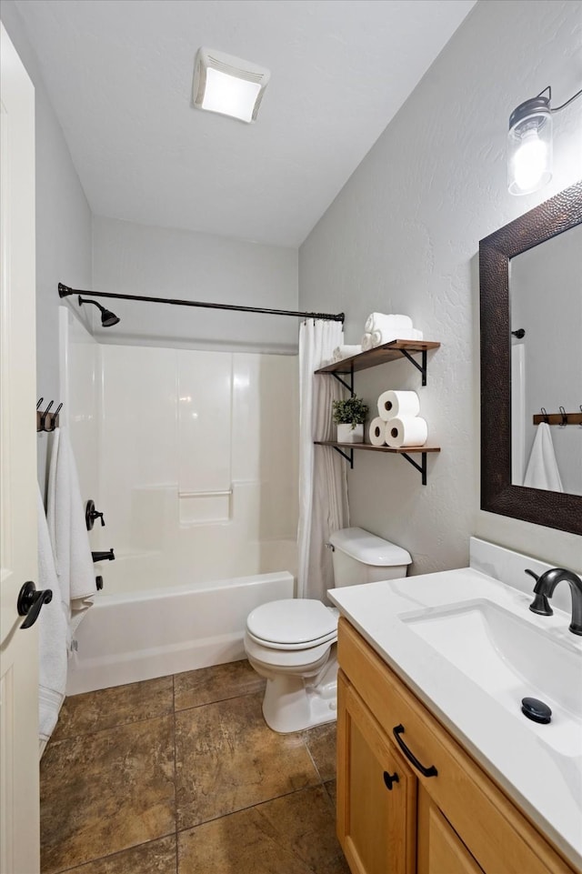 full bathroom with toilet, shower / bath combination with curtain, and vanity