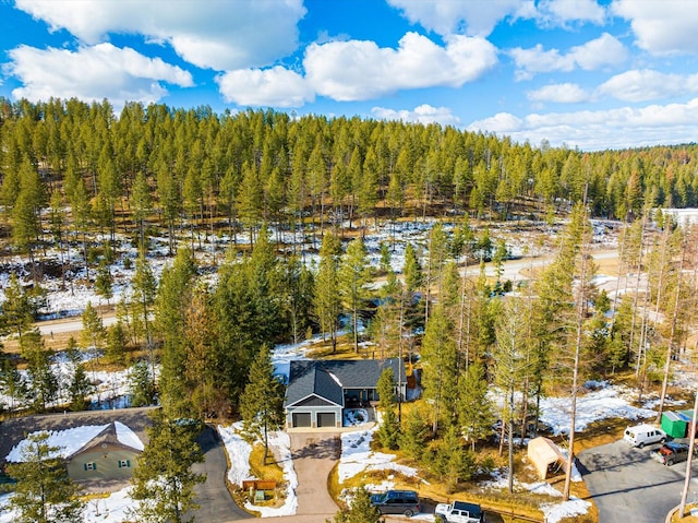 bird's eye view with a forest view