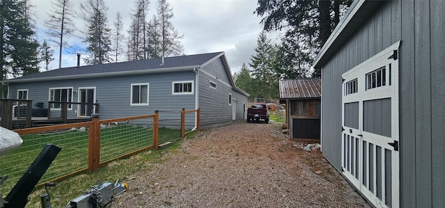 2010 Silvertip Dr S, Bigfork, MT 59911 - view of property exterior with an outbuilding