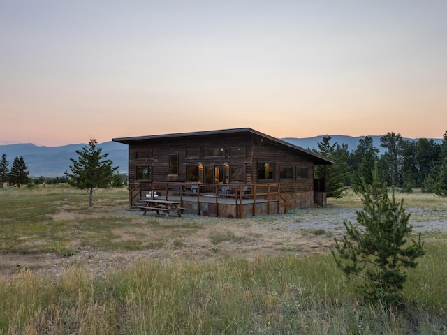 rear view of house with a mountain view