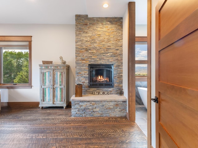 unfurnished living room featuring a fireplace