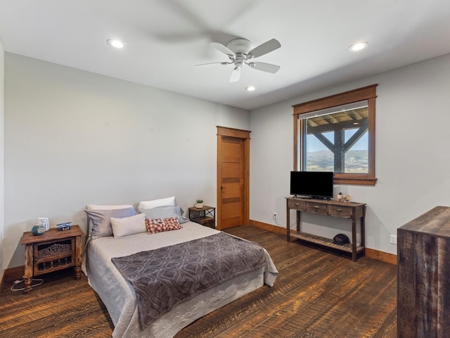 bedroom featuring recessed lighting, wood finished floors, and baseboards