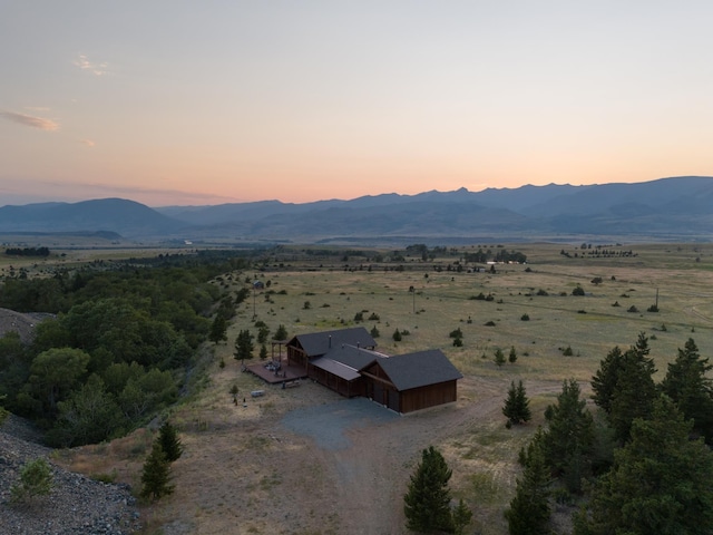 view of mountain feature with a rural view