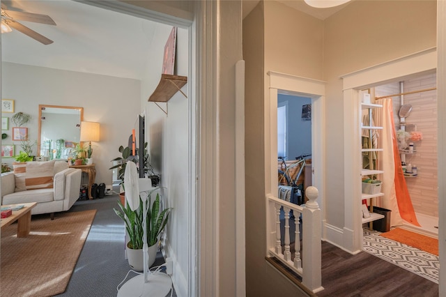 hall featuring wood finished floors