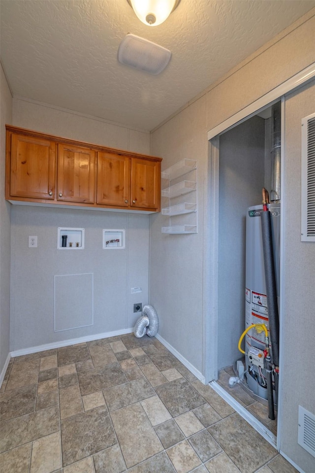 clothes washing area featuring hookup for a washing machine, cabinet space, water heater, electric dryer hookup, and a textured ceiling