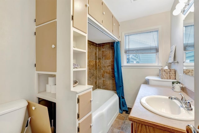 bathroom with shower / bath combo, vanity, and toilet