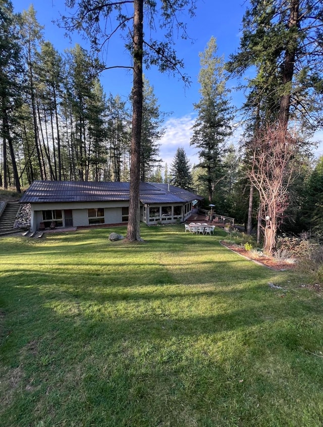 456 Peaceful Dr, Bigfork, MT 59911 - view of front of home featuring a front lawn