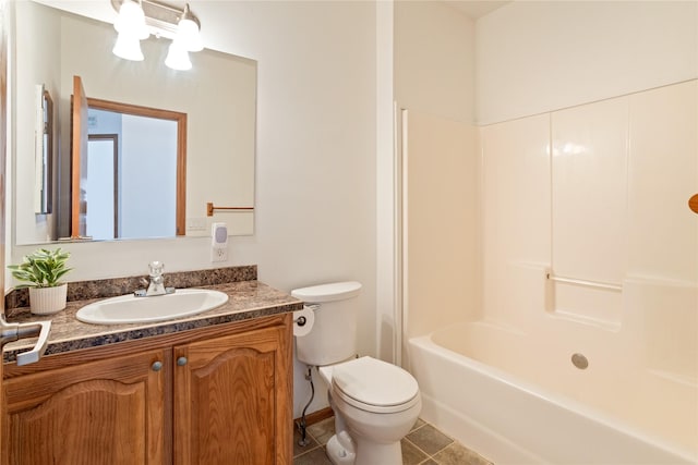 full bath with toilet, tile patterned flooring, and vanity