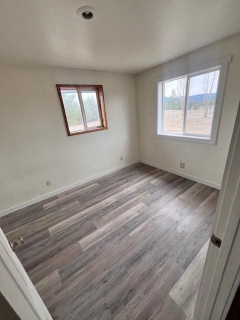 116 Happy Holw, Eureka, MT 59917 - unfurnished room with wood finished floors and baseboards