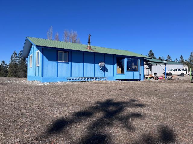 116 Happy Holw, Eureka, MT 59917 - back of property with a metal roof