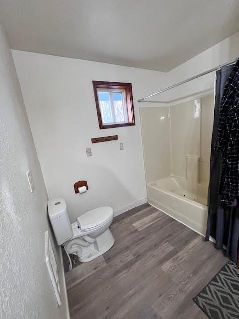 116 Happy Holw, Eureka, MT 59917 - bathroom featuring wood finished floors and shower / bathtub combination with curtain