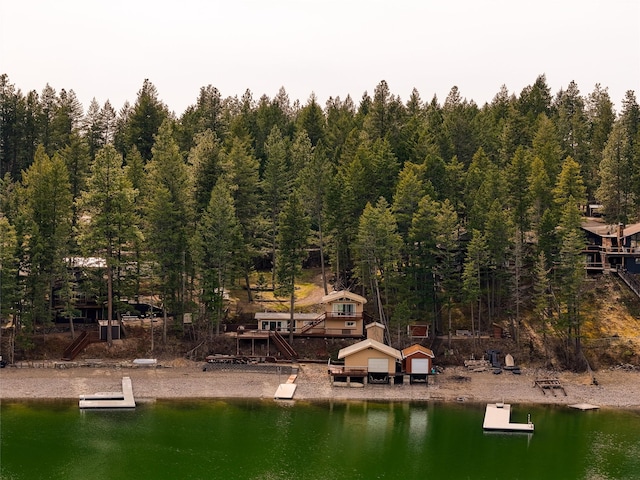 237 Lake Blaine Dr, Kalispell, MT 59901 - drone / aerial view featuring a water view and a view of trees