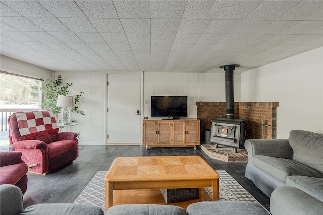 237 Lake Blaine Dr, Kalispell, MT 59901 - living area with wood finished floors and a wood stove