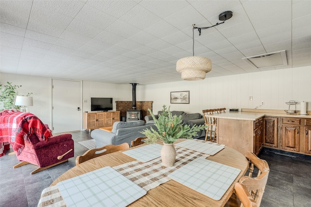 237 Lake Blaine Dr, Kalispell, MT 59901 - dining area featuring a wood stove