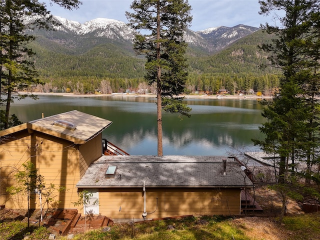 237 Lake Blaine Dr, Kalispell, MT 59901 - dock area with a wooded view and a water and mountain view