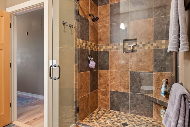 bathroom featuring a stall shower