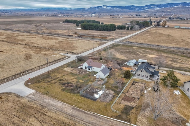 aerial view featuring a mountain view and a rural view